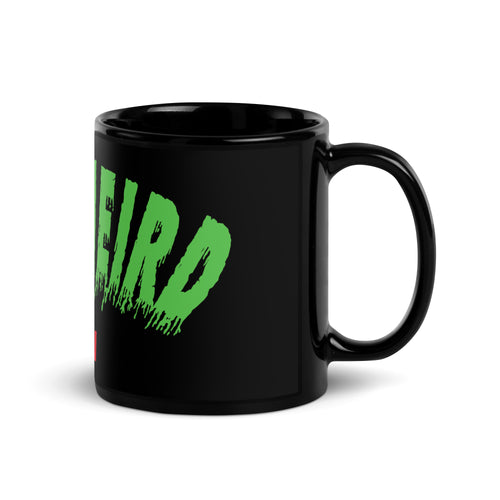 Black mug with ‘Stay Weird’ print.