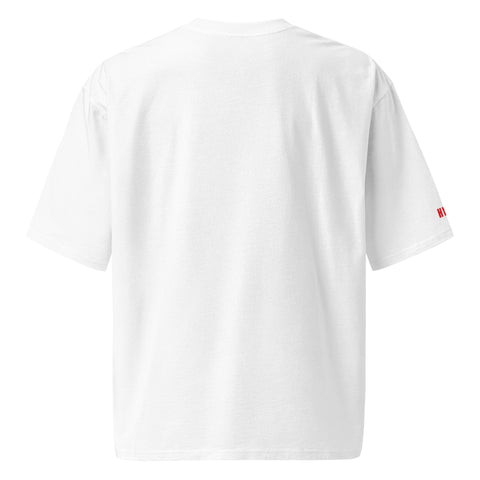 Stay Weird printed on a black oversized T-shirt 