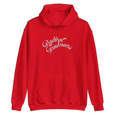 Red hoodie with 'Radical Tenderness' white text on a red background